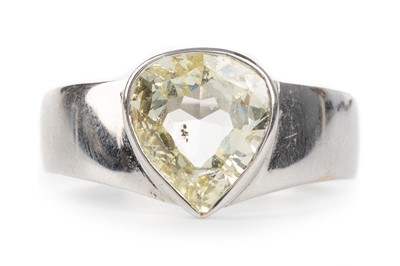 Lot 514 - YELLOW DIAMOND SOLITAIRE RING