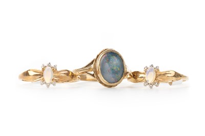 Lot 530 - THREE OPAL RINGS