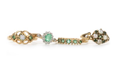Lot 540 - FOUR EMERALD AND DIAMOND RINGS