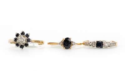 Lot 556 - THREE SAPPHIRE RINGS