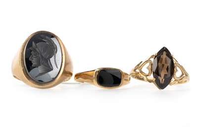 Lot 558 - THREE GOLD DRESS RINGS