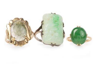 Lot 582 - THREE GREEN HARDSTONE RINGS