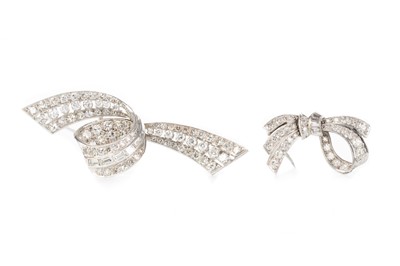 Lot 616 - TWO DIAMOND SET RIBBON BROOCHES
