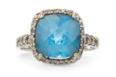 Lot 435 - TOPAZ AND DIAMOND DRESS RING