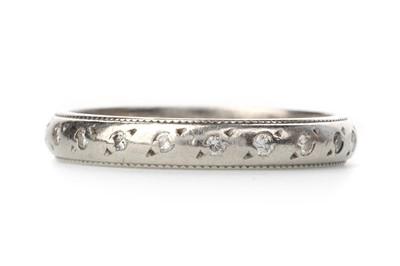 Lot 515 - PLATINUM AND DIAMOND ETERNITY RING