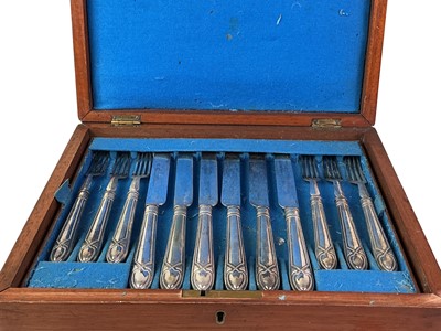 Lot 15 - MAHOGANY CANTEEN OF SILVER PLATED FRUIT KNIVES AND FORKS