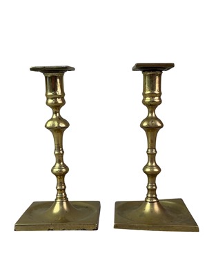 Lot 155 - PAIR OF GEORGIAN BRASS CANDLESTICKS