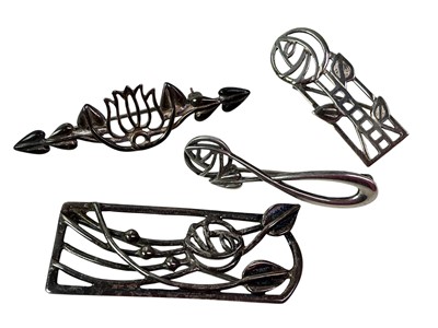 Lot 242 - FOUR SILVER BROOCHES