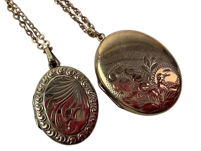 Lot 477 - THREE LOCKET PENDANTS ON CHAINS