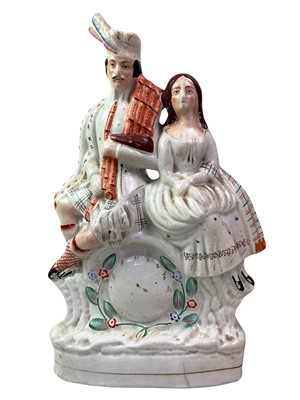 Lot 544 - THREE STAFFORDSHIRE FLATBACK SPILL VASES