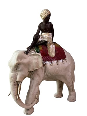 Lot 562 - PAINTED STUCCO FIGURE