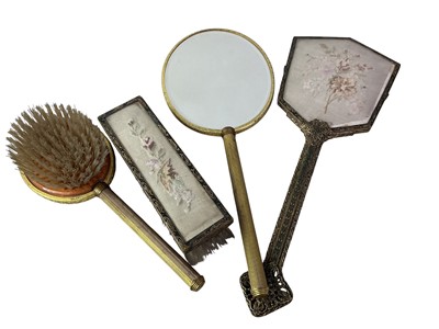Lot 794 - GILT METAL AND EMBROIDERED SEVEN PIECE VANITY SET