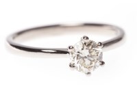 Lot 142 - DIAMOND SOLITAIRE RING with a six claw set...