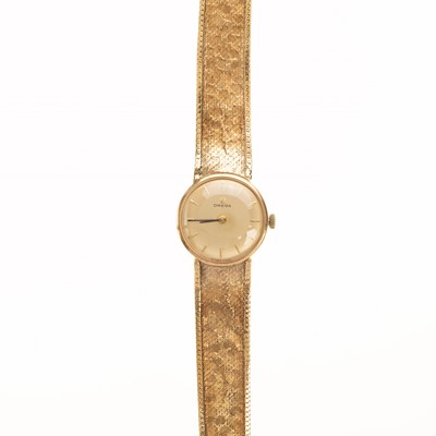 Lot 883 - LADY'S OMEGA NINE CARAT GOLD MANUAL WIND WRIST WATCH