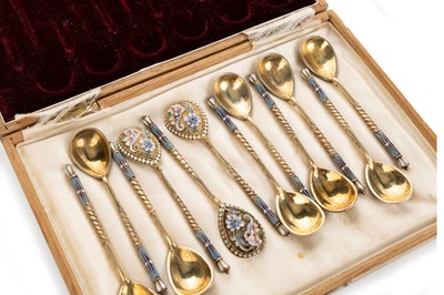 Lot 984 - SET OF TWELVE RUSSIAN SILVER-GILT CHAMPLEVE ENAMEL CAVIAR SPOONS