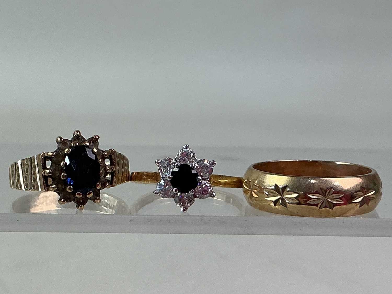 Lot 146 - THREE GOLD RINGS,