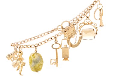 Lot 522 - GOLD CHARM BRACELET
