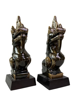 Lot 233 - PAIR OF CERAMIC THAI DRAGON BOOKENDS