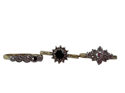 Lot 428 - THREE GOLD RINGS