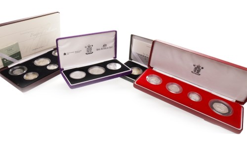Lot 548 - FOUR SILVER PROOF COIN SETS including the...