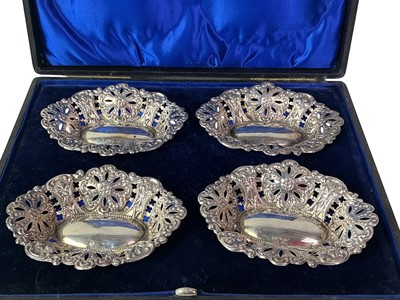 Lot 515 - SET OF FOUR SILVER BONBON DISHES