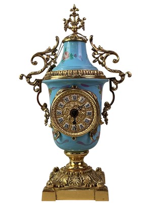 Lot 658 - CERAMIC AND GILT METAL MANTEL CLOCK