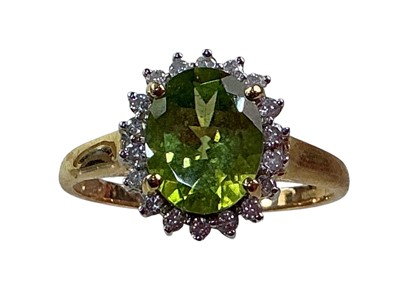 Lot 685 - PERIDOT CLUSTER RING