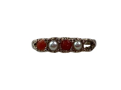 Lot 261 - PEARL AND CORAL RING