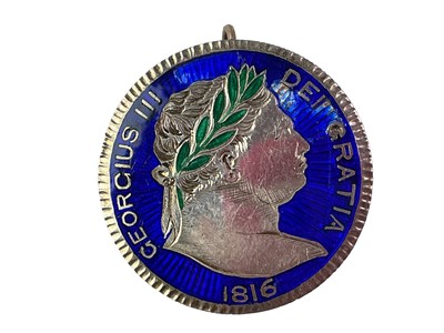 Lot 374 - GEORGE III ENAMELLED SILVER COIN BROOCH