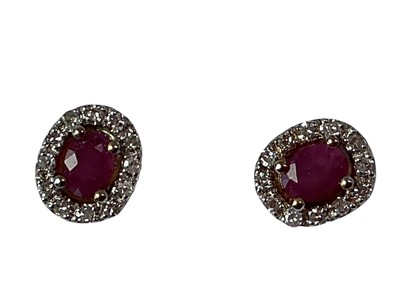 Lot 402 - RUBY AND DIAMOND PENDANT ON CHAIN AND A PAIR OF EARRINGS