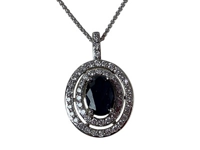 Lot 404 - SAPPHIRE AND DIAMOND PENDANT ON CHAIN AND A PAIR OF EARRINGS