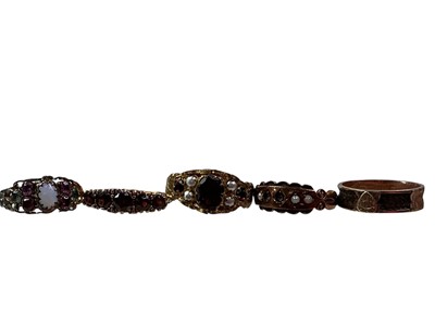 Lot 420 - GARNET FIVE STONE RING