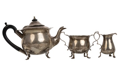 Lot 1016 - EDWARDIAN SILVER THREE PIECE BACHELOR'S TEA SERVICE