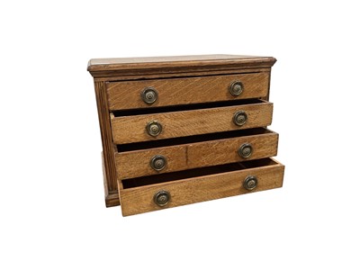 Lot 1340 - EDWARDIAN OAK TABLE CABINET