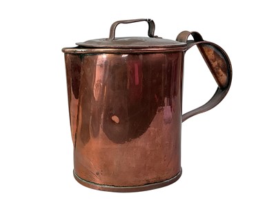 Lot 669 - BRASS WATER JUG