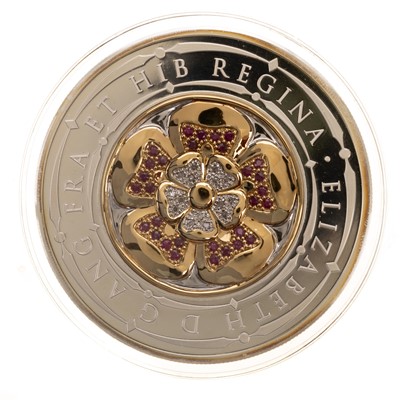 Lot 35 - THE ELIZABETH I DIAMOND AND RUBY PAVE SET COIN
