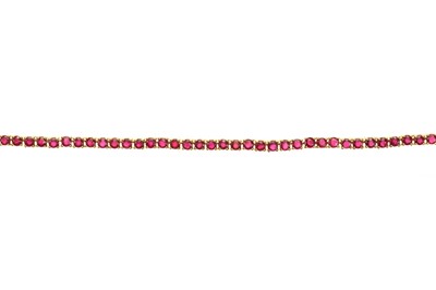 Lot 454 - SYNTHETIC RUBY TENNIS BRACELET