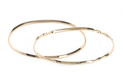 Lot 469 - THREE GOLD BANGLES