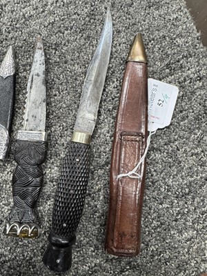 Lot 52 - THREE SILVER MOUNTED SGIAN DUBH