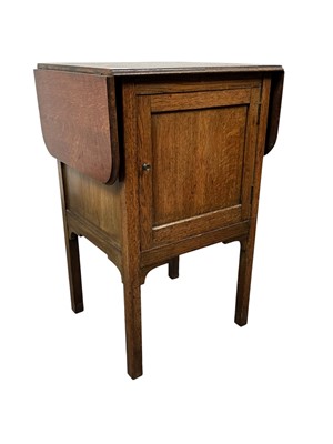 Lot 152 - EDWARDIAN OAK BEDSIDE CUPBOARD