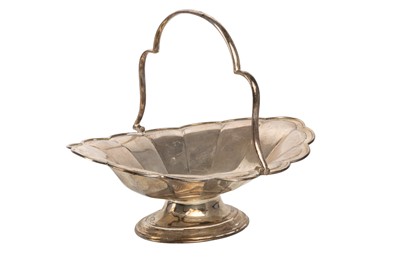 Lot 1041 - GEORGE V SILVER HANDLED BASKET
