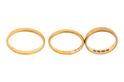 Lot 504 - THREE WEDDING BANDS