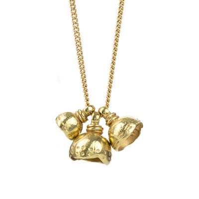 Lot 523 - GOLD 'TEMPO TRIO CHARM' NECKLACE