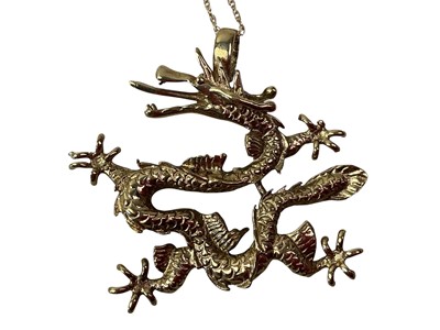 Lot 722 - TWO GOLD PENDANTS ON CHAINS