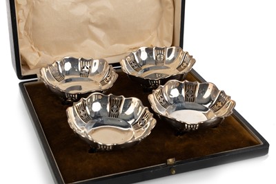 Lot 1059 - SET OF FOUR GEORGE V SILVER BON BON DISHES