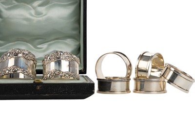 Lot 1056 - SET OF FOUR SILVER NAPKIN RINGS
