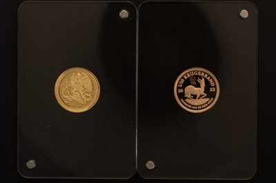 Lot 44 - THE END OF AN ERA GOLD TWO COIN SET
