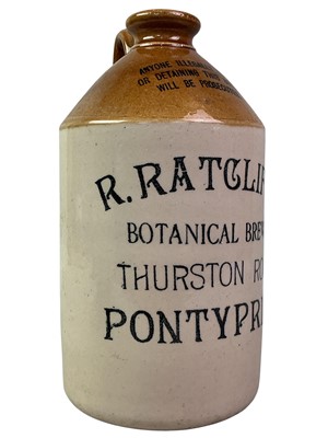 Lot 175 - STONEWARE WHISKY FLAGON