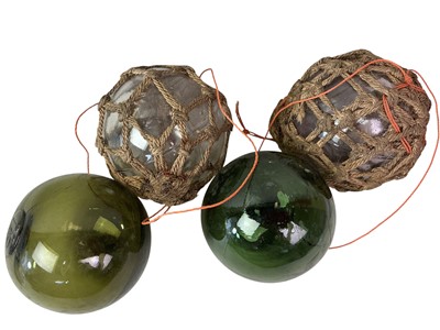 Lot 179 - FOUR VINTAGE GLASS FISHING FLOATS