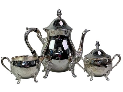 Lot 23 - SILVER PLATED THREE PIECE TEA SERVICE